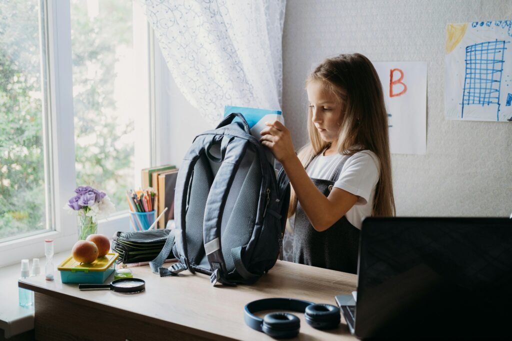 Back to school, schoolchildren hygiene, safety precautions after coronavirus. The schoolgirl is